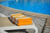 depositphotos_68239001-stock-photo-two-yellow-striped-towels-lie.jpg